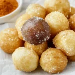 Puff-Puffs – afrikanischer Snack mit Gewürzzucker-Variation First Image First Image