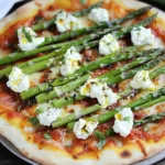 Pizza mit grünem Spargel und Ziegenkäse First Image First Image